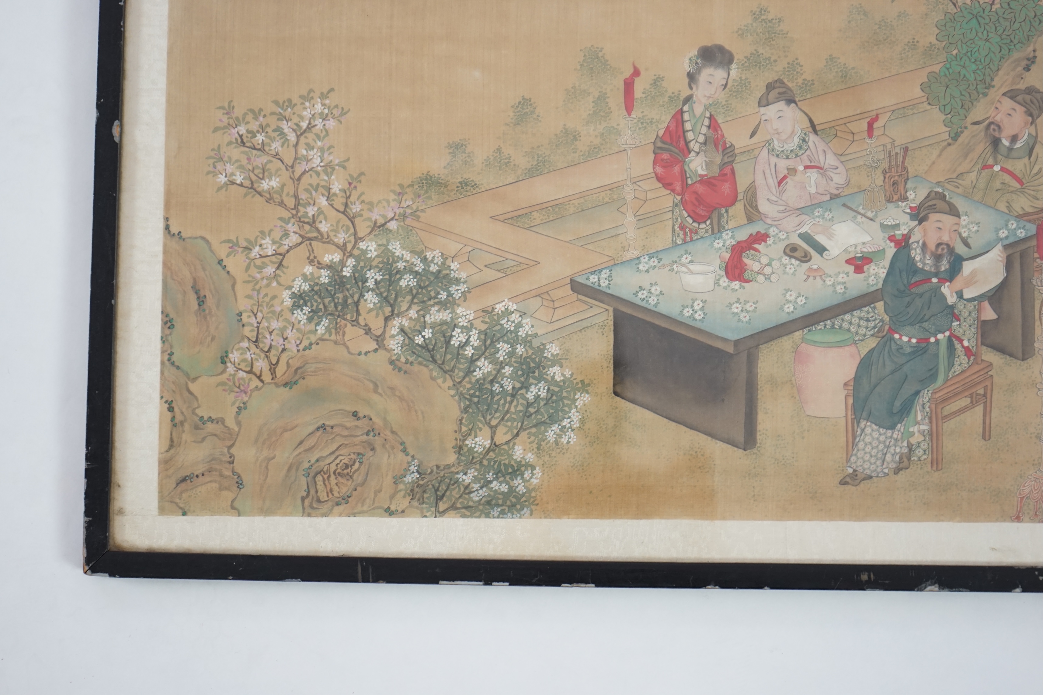 Chinese School, late 19th century, painting on silk, Scholars and attendants in a garden, 35cm x 58cm, framed and glazed. Condition - fair, some general discolouration